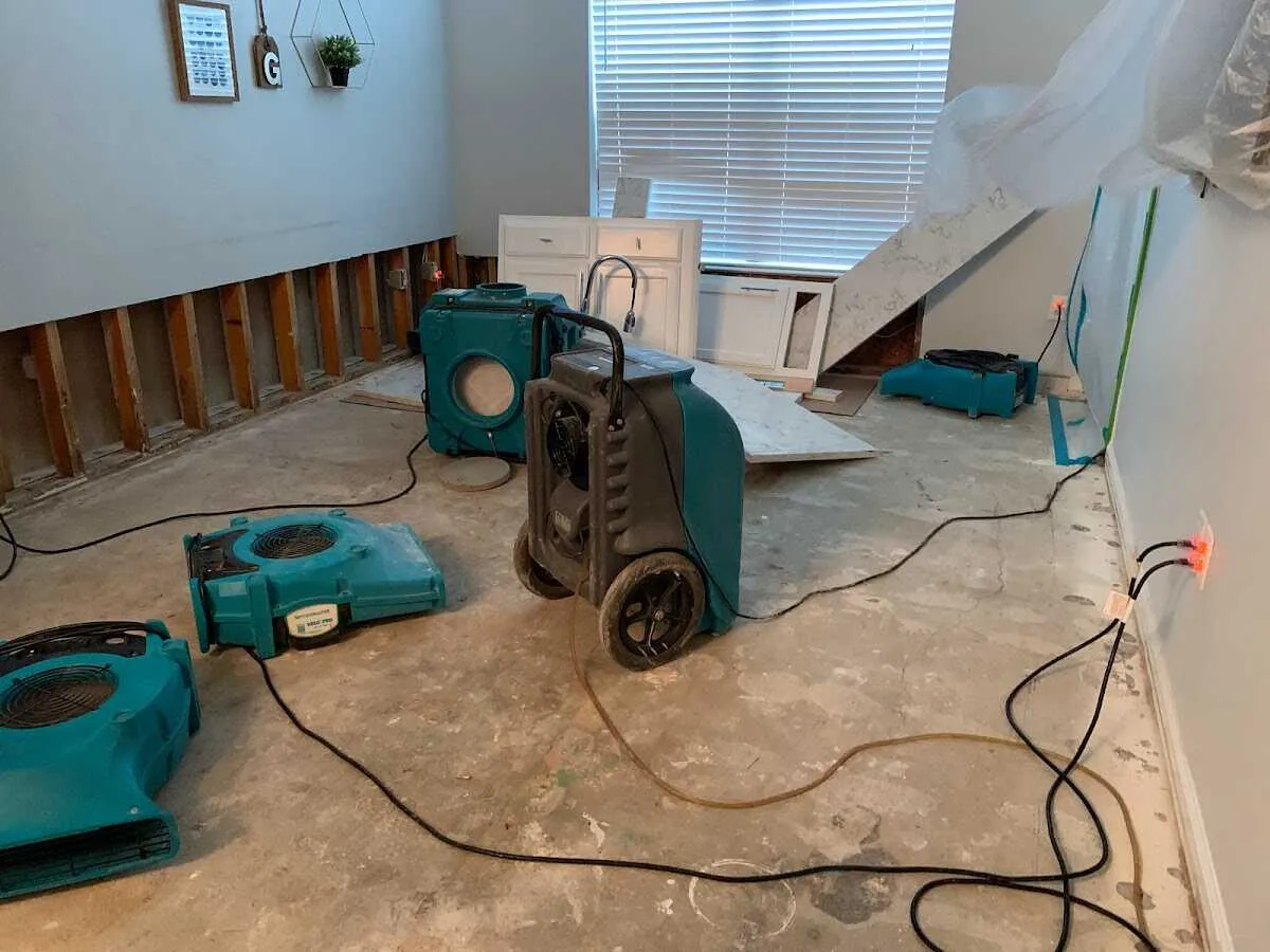 Dehumidifier in flood-cut room for Water Damage Restoration in East St. Louis